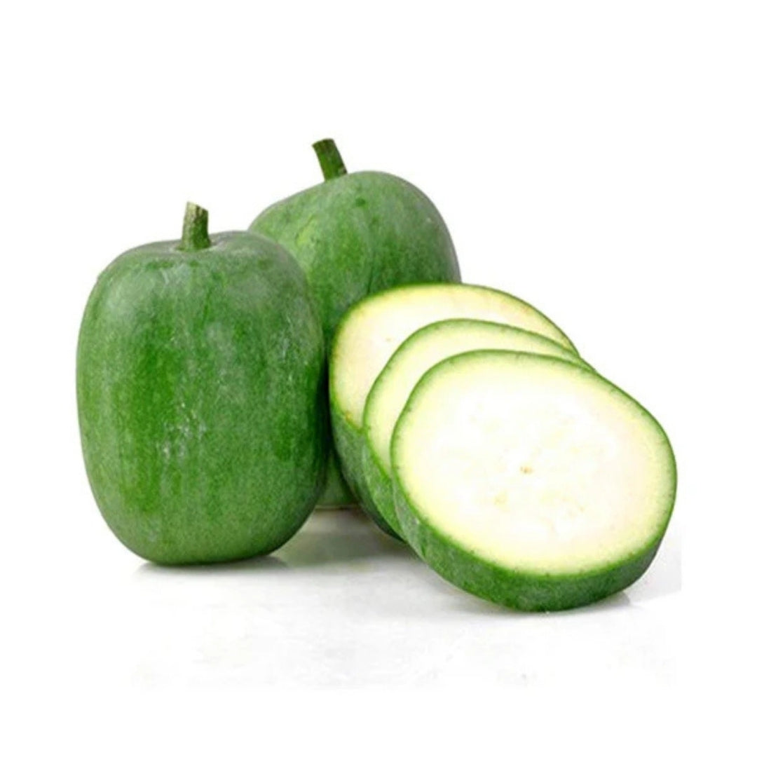 Fresh organic ash gourd with sliced pieces, perfect for healthy cooking and salads