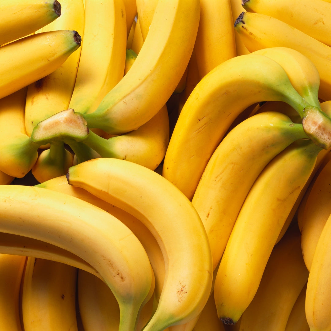 Fresh organic desi banana online displayed in a vibrant yellow cluster