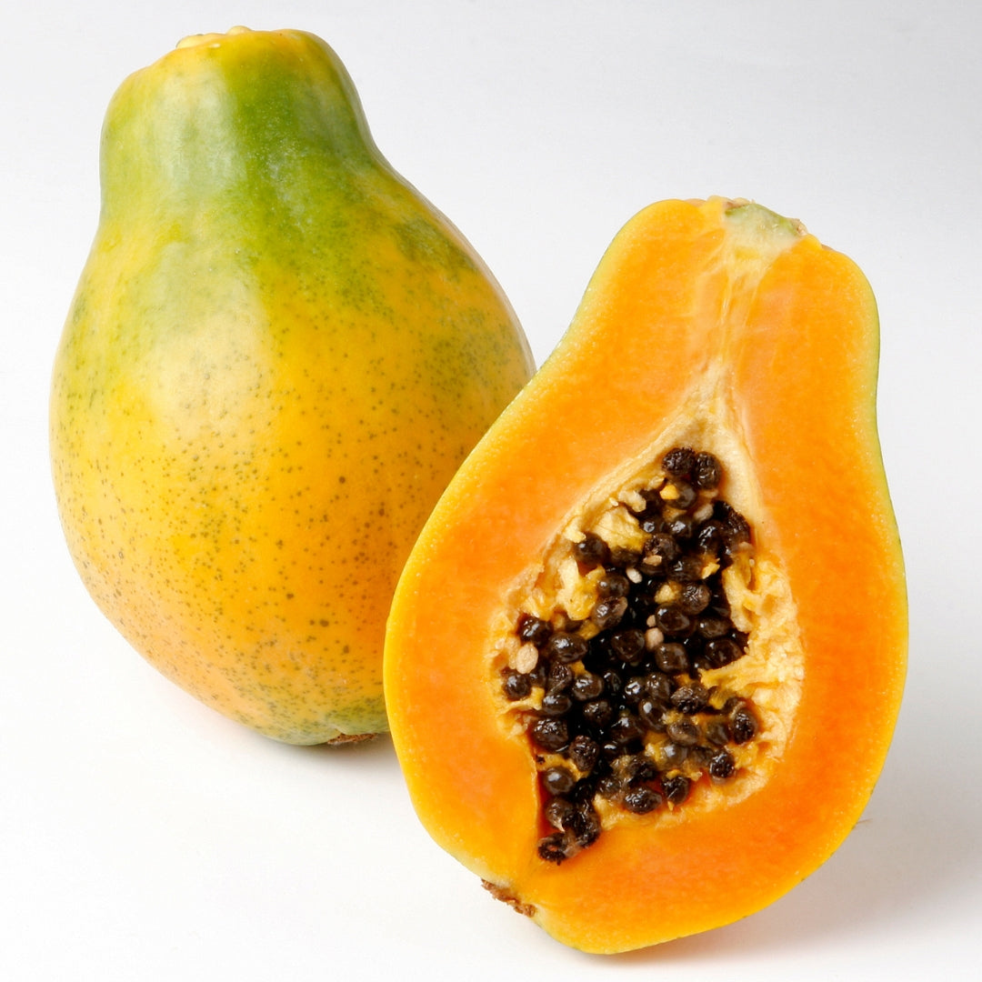 Fresh organic papaya cut in half showcasing ripe orange flesh, available online Mumbai