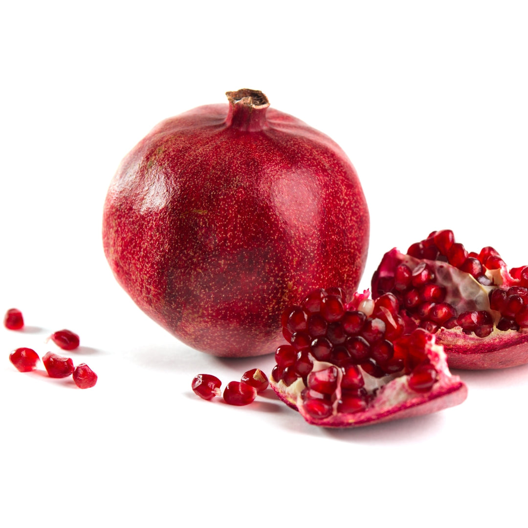 Fresh organic pomegranate online Mumbai with juicy red seeds and split rind for healthy snacking