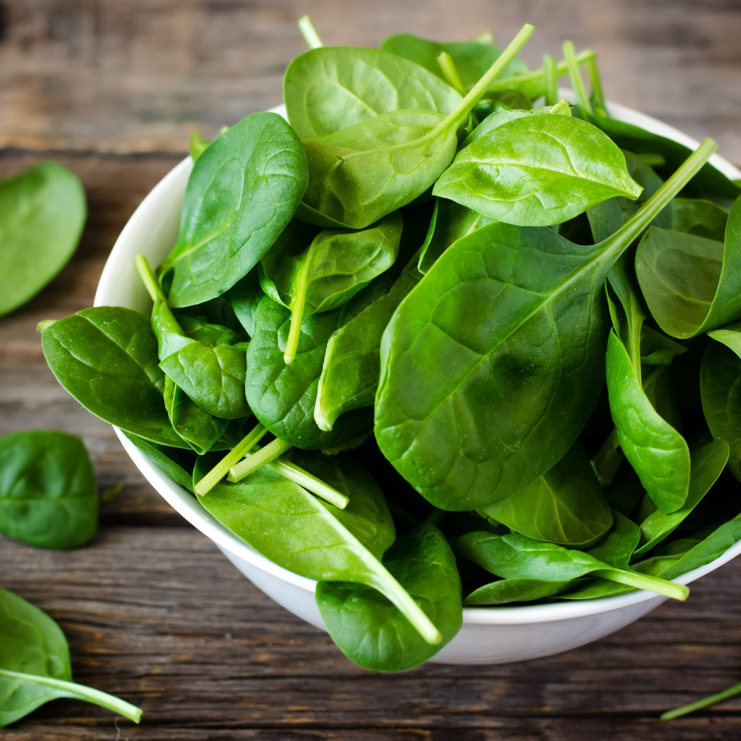 Fresh organic spinach online Mumbai in a bowl, ideal for healthy salads and cooking