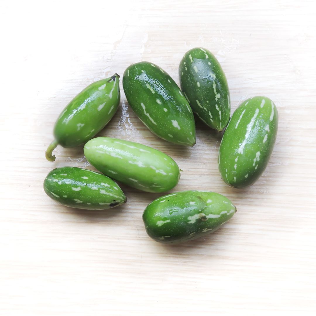 Fresh Organic Tondali vegetables on a wooden surface, ideal to Buy Ivy Gourd Online Navi Mumbai